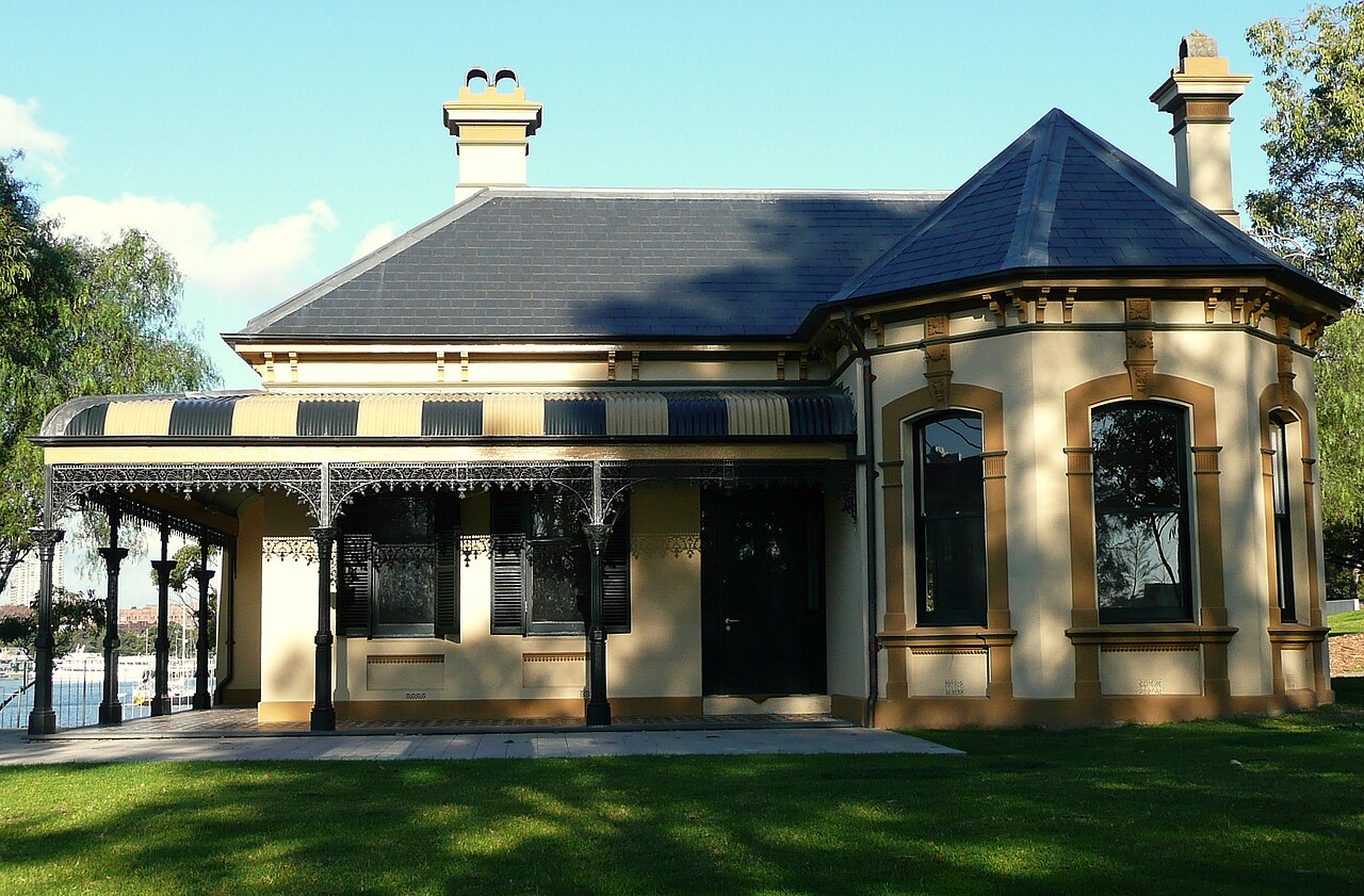 Bellevue’s cream façade, projecting window bay, slate roof, tall chimneys and iron-lace verandah, photographed in 2008.