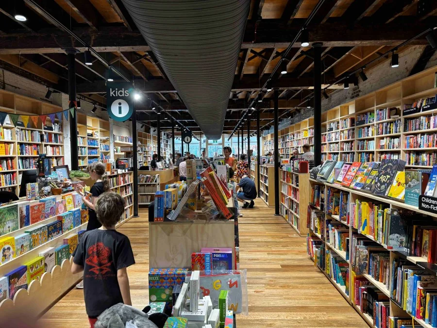 Bookshelves and readers inside the renovated Gleebooks on Glebe Point Road.