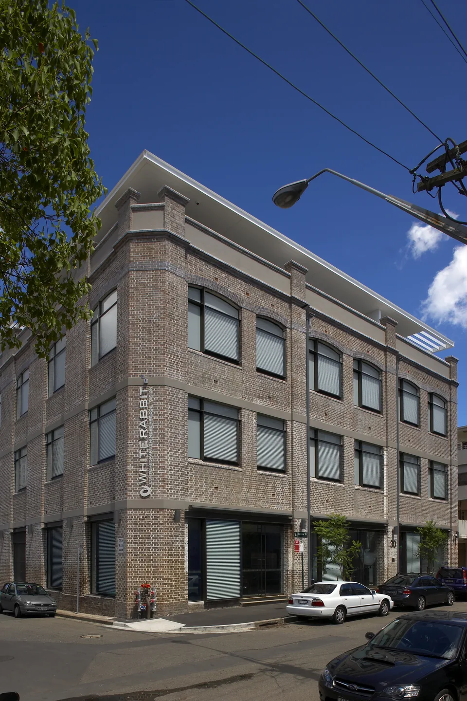 White Rabbit Gallery’s brick facade and entrance at 30 Balfour Street, Chippendale.