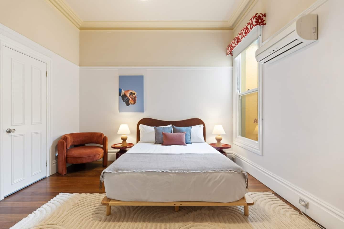 The Old Fashioned Room with amber accents and warm timber tones